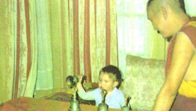 Fourteen-month-old Osel correctly selects the bell that belonged to a recently deceased monk, Lama Yeshe, helping to confirm his reincarnation