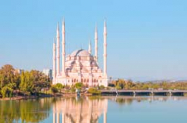 View of the stone bridge and Sadanci mosque at Adana, southern Turkey photograph of stone bridge and mosque at Adana