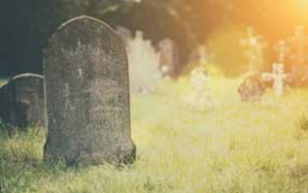 photograph of old gravestone in churchyard