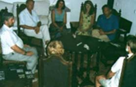 Sitting for physical phenomena of mediumship at Scole, Norfolk Photograph of a sitting for physical phenomena of mediumship at Scole, Norfolk