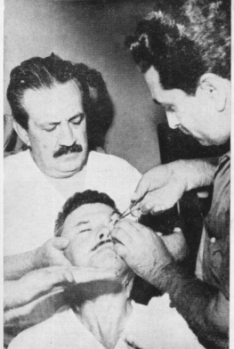 photo of patient being operated by Arigo 