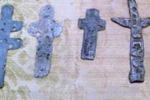Photograph of examples of the 1500 Aztec Indian crosses found buried in remote locations