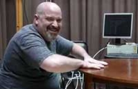 Ariel Farias during a laboratory experiment Photograph of Ariel Farias during a laboratory experiment
