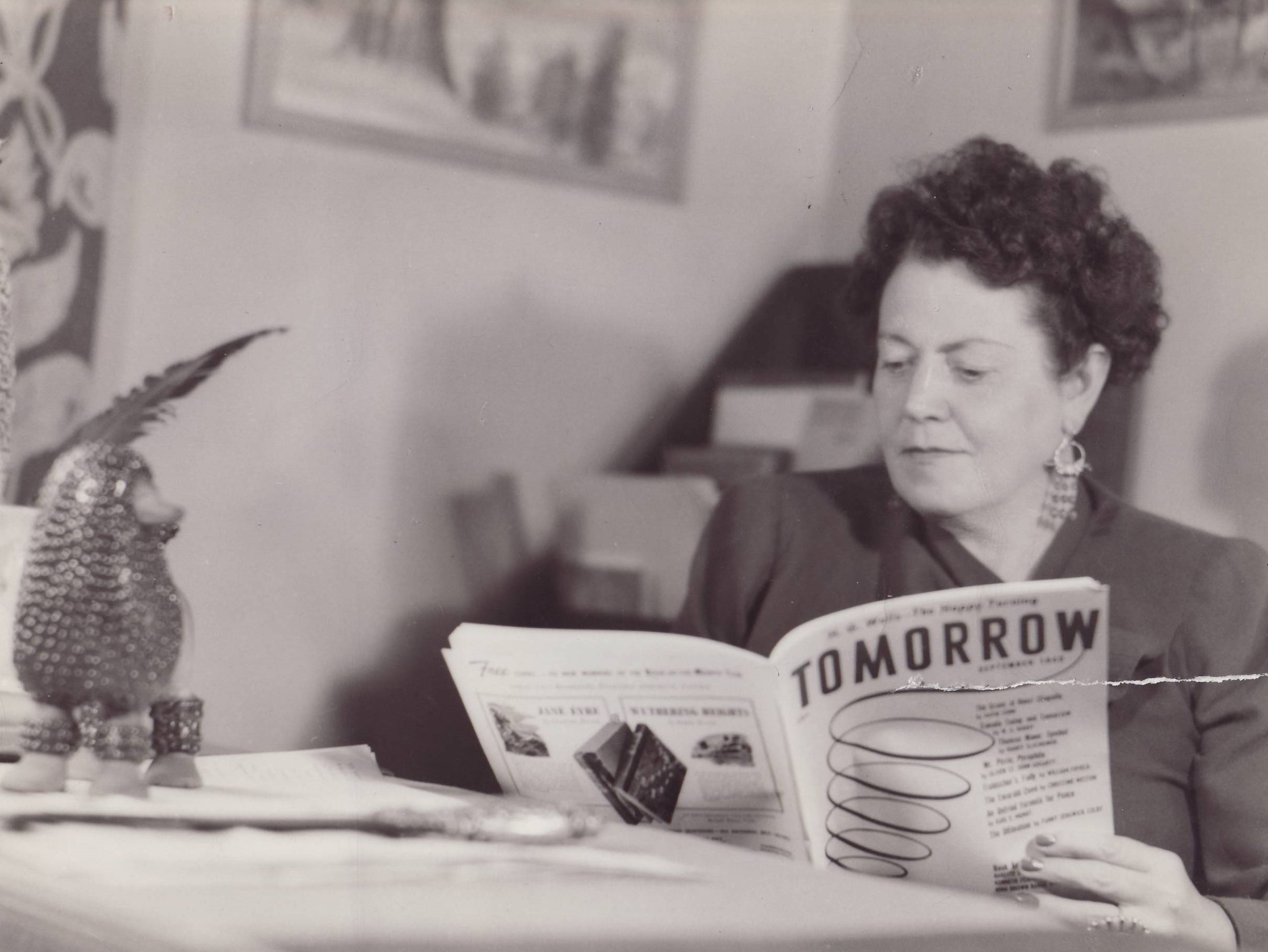 Eileen Garrett reading the first issue of Tomorrow magazine